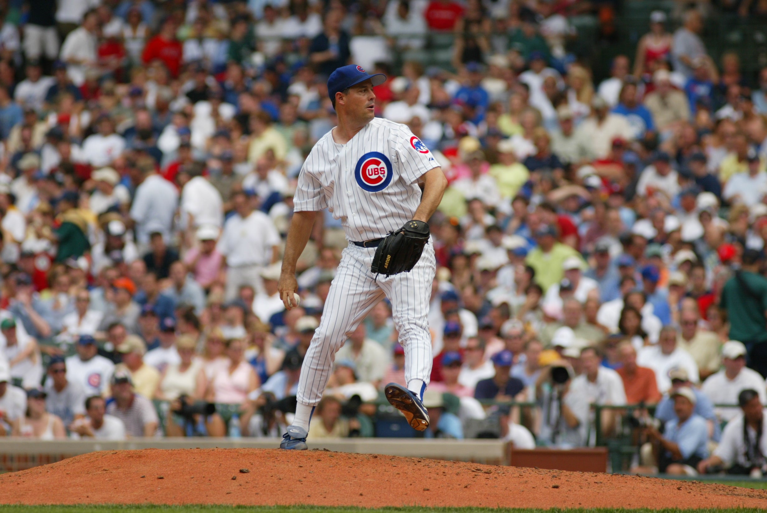 Cubs to retire number worn by Jenkins, Maddux