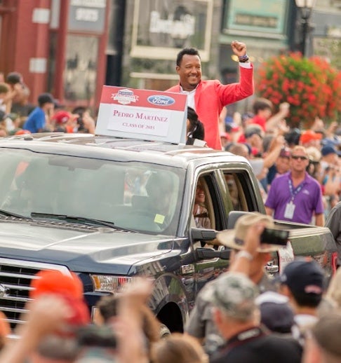Pedro Martinez riding in a truck during the Parade of Legends