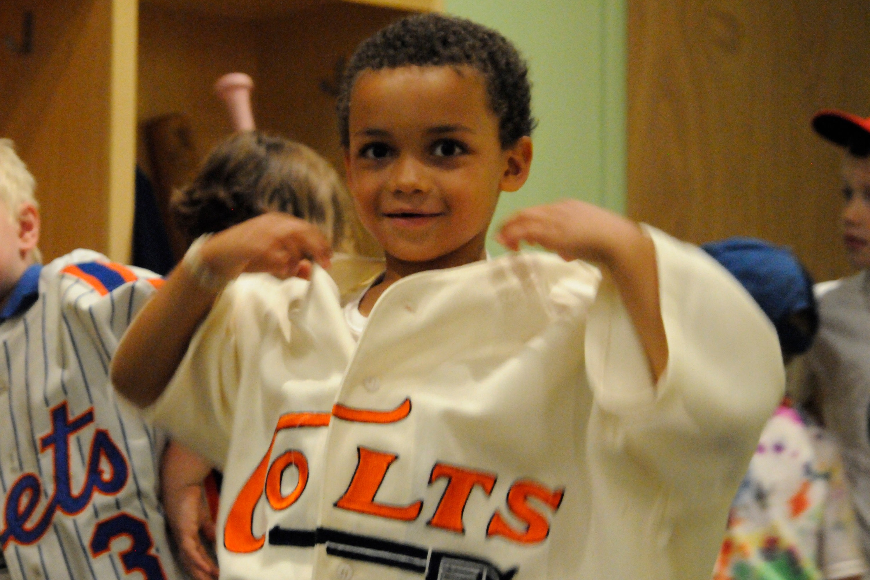Young boy wearing Colts 45s baseball jersey