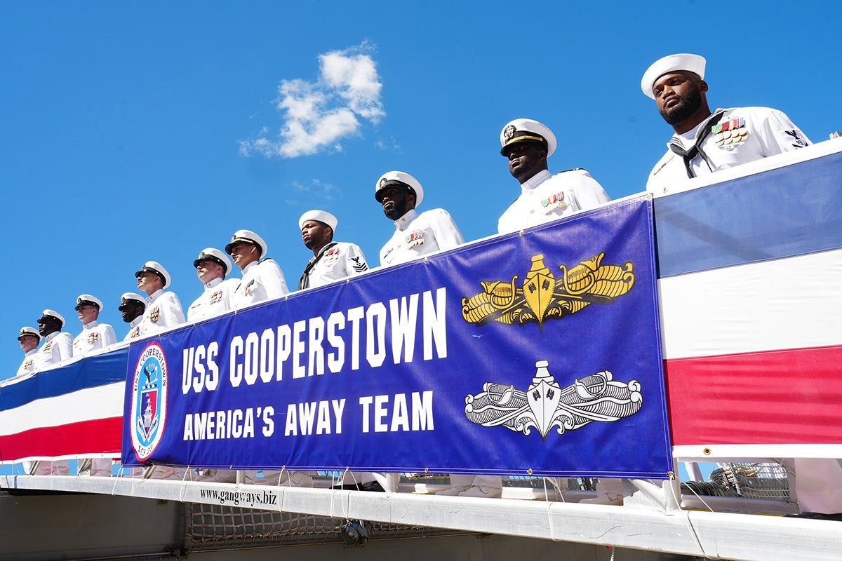 Sailors aboard the USS Cooperstown