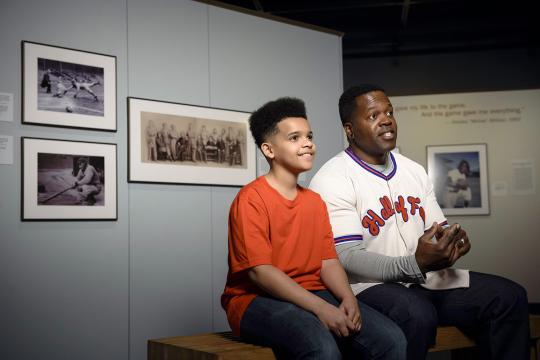 father and son in the picturing america's pastime exhibit