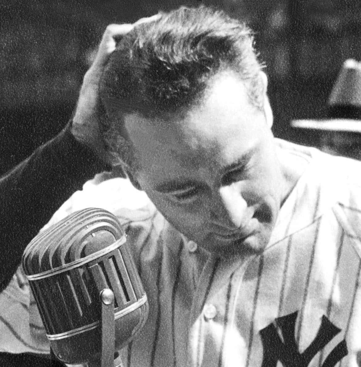 Lou Gehrig at a microphone