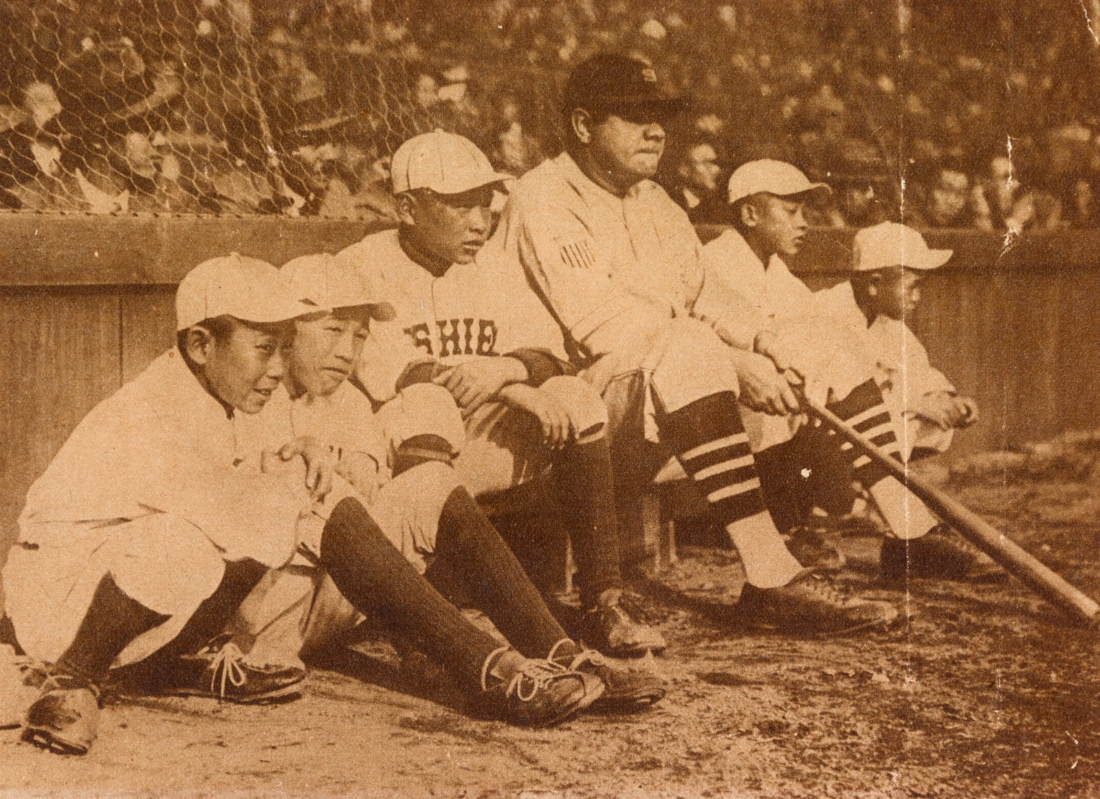 Babe Ruth with Japanese ball players during the 1934 World Tour