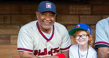 Ozzie Smith with young fan