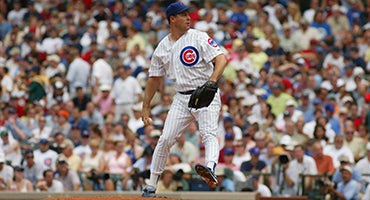 Greg Maddux pitches for Cubs