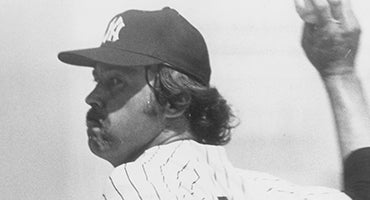 Catfish Hunter pitches for Yankees