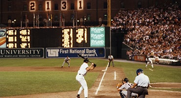 Cal Ripken Jr. bats underneath 2131 sign in right field