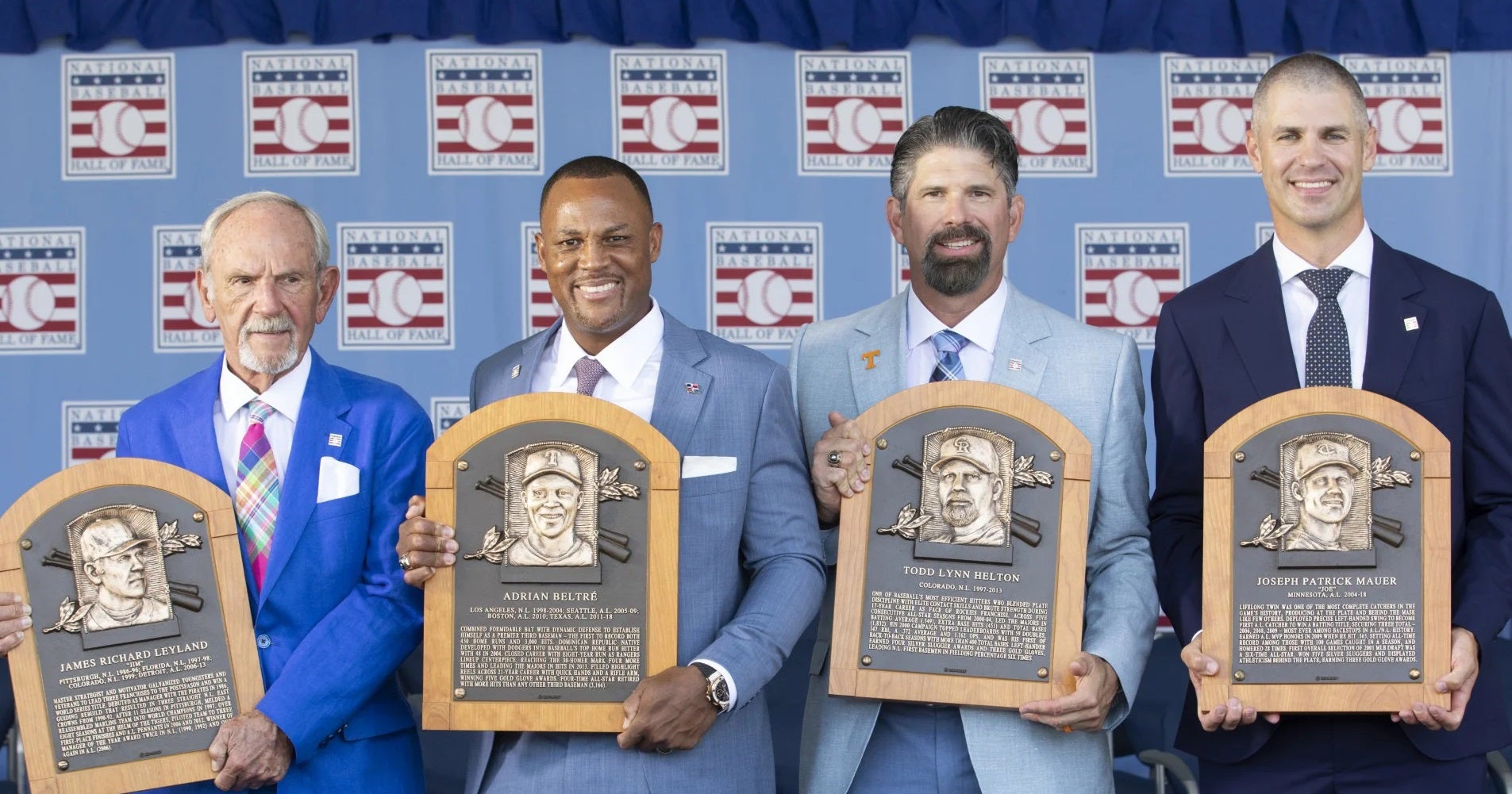 Adrian Beltre, Todd Helton, Joe Mauer, and Jim Leyland, holding their plaquesClass of 2024