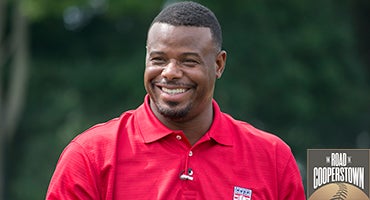 Ken Griffey Jr. smiles wearing red Hall of Fame polo