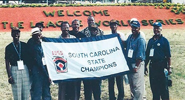 Cannon Street All-Stars with banner