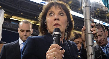 Suzyn Waldman holding microphone