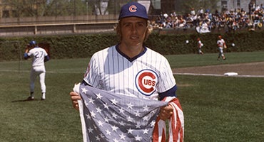 Rick Monday with United States flag