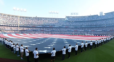 Outstretched American flag at Dodger Stadium