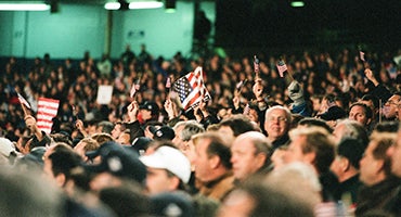 Baseball fans waving United States flags