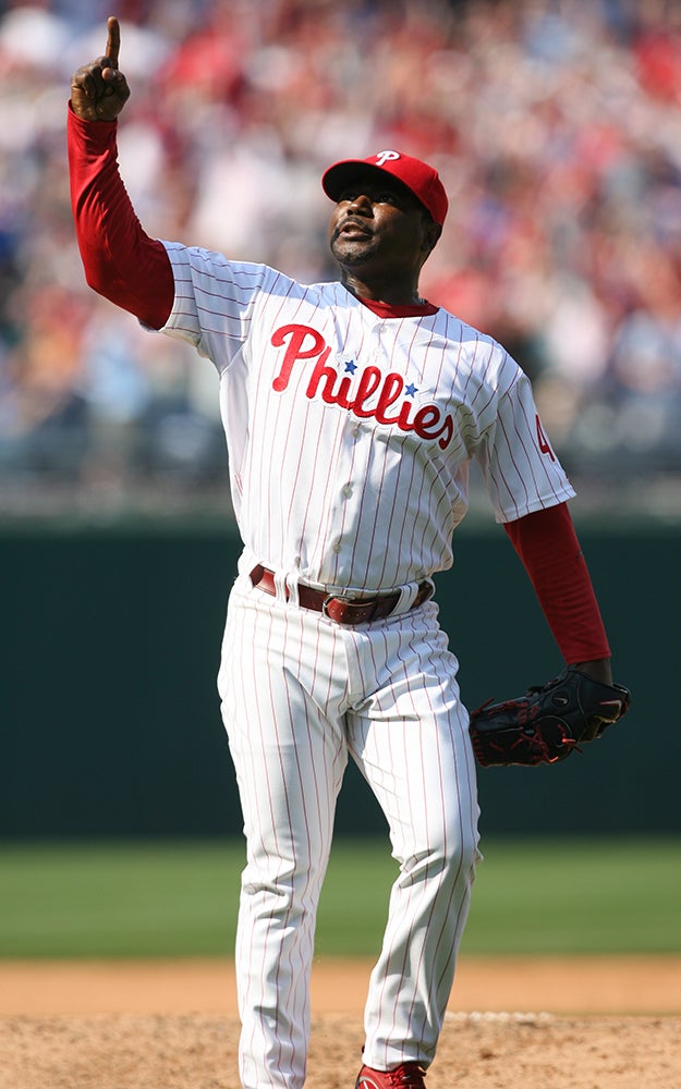 Tom Gordon wearing Phillies uniform pointing skyward