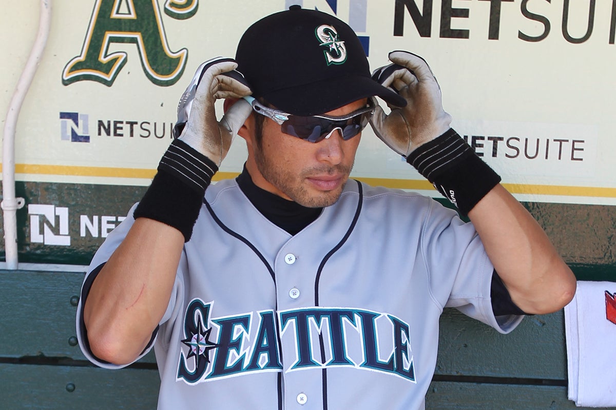 Ichiro Suzuki adjusts sunglasses