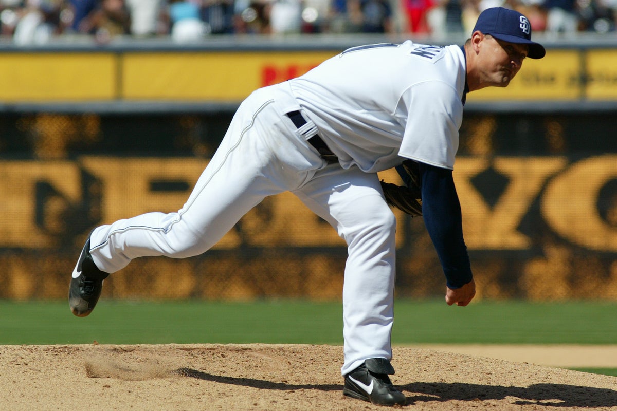 Trevor Hoffman follows through on right-handed throwing motion