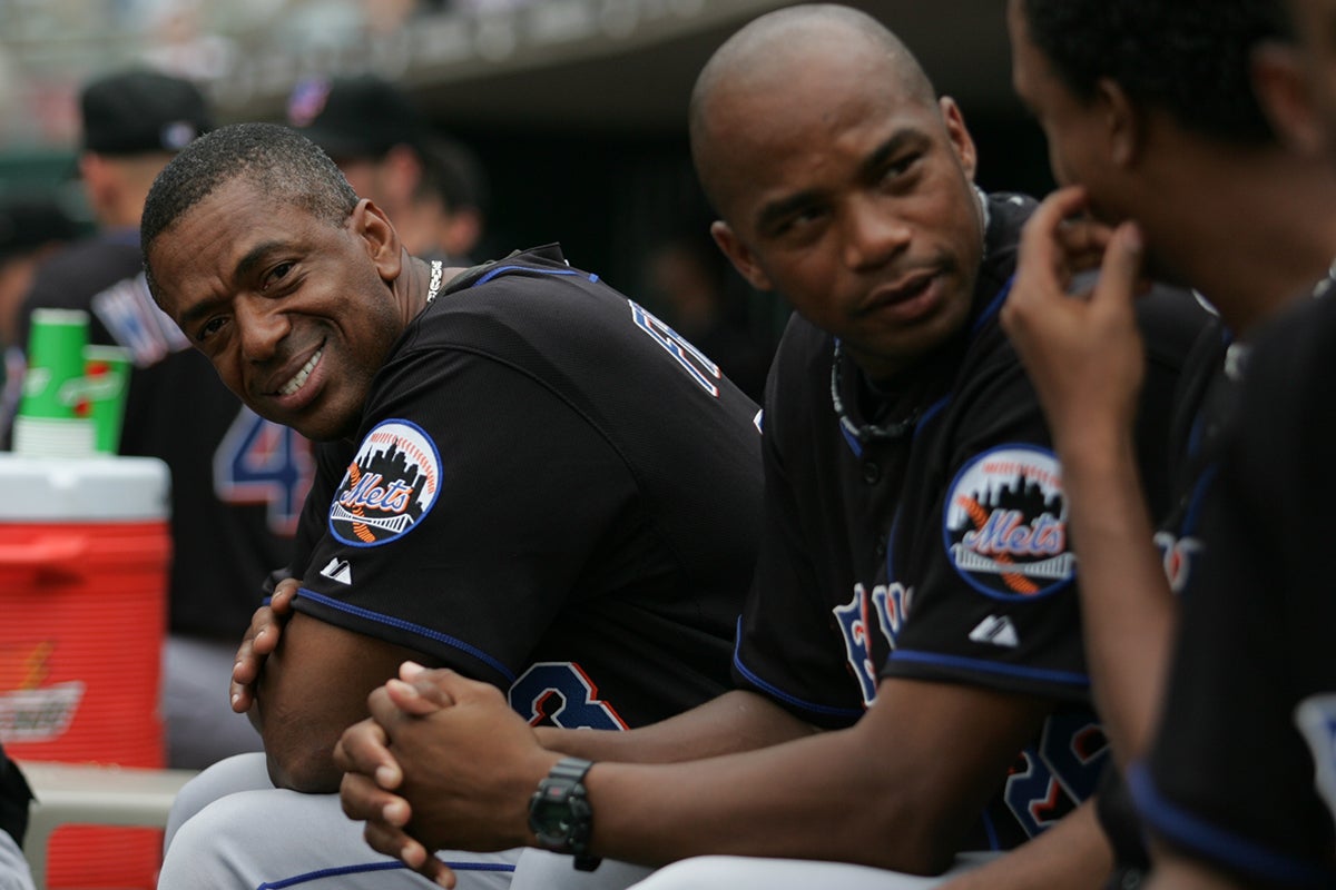 Julio Franco seated in Mets dugout