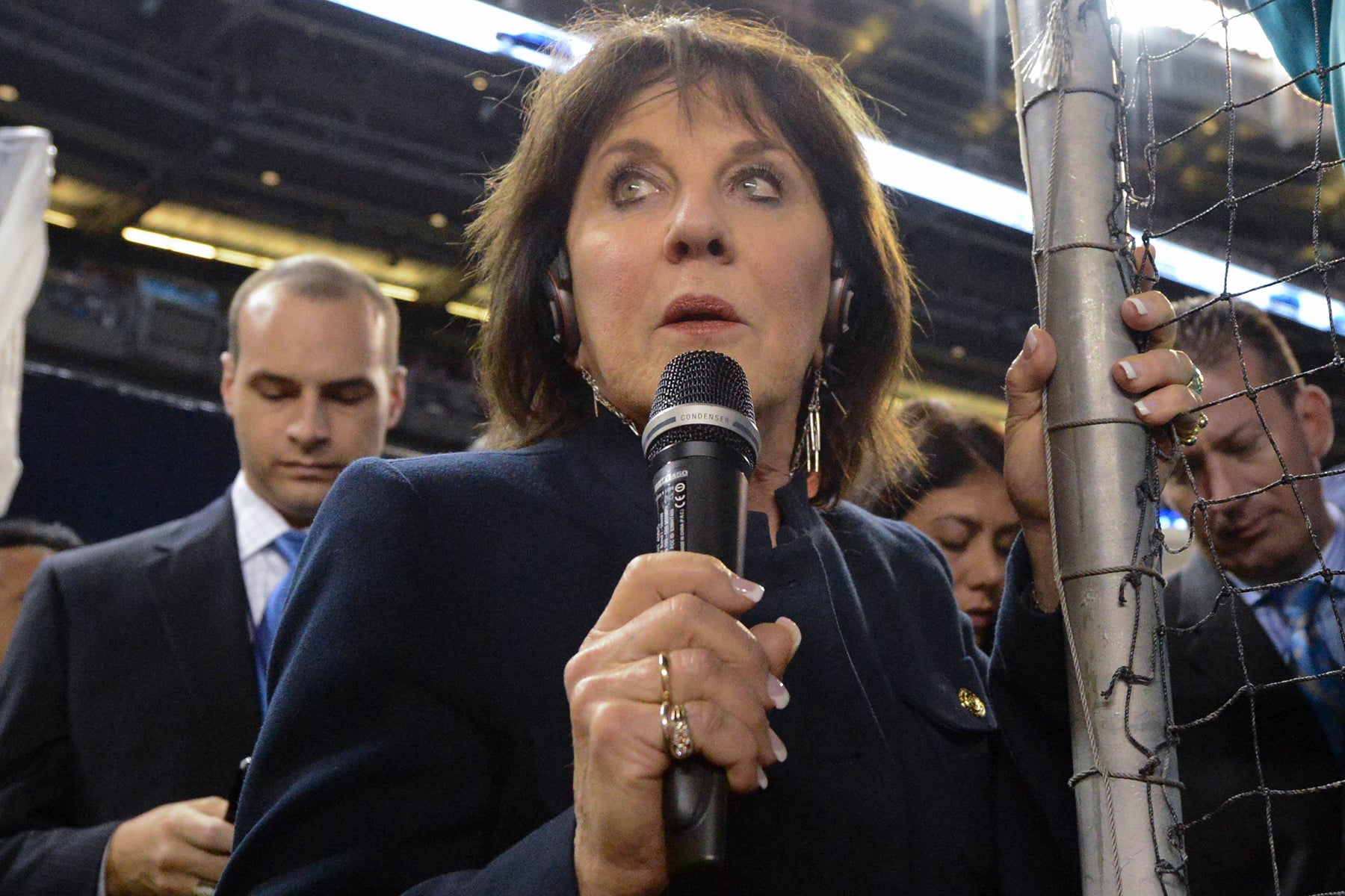 Suzyn Waldman holding microphone