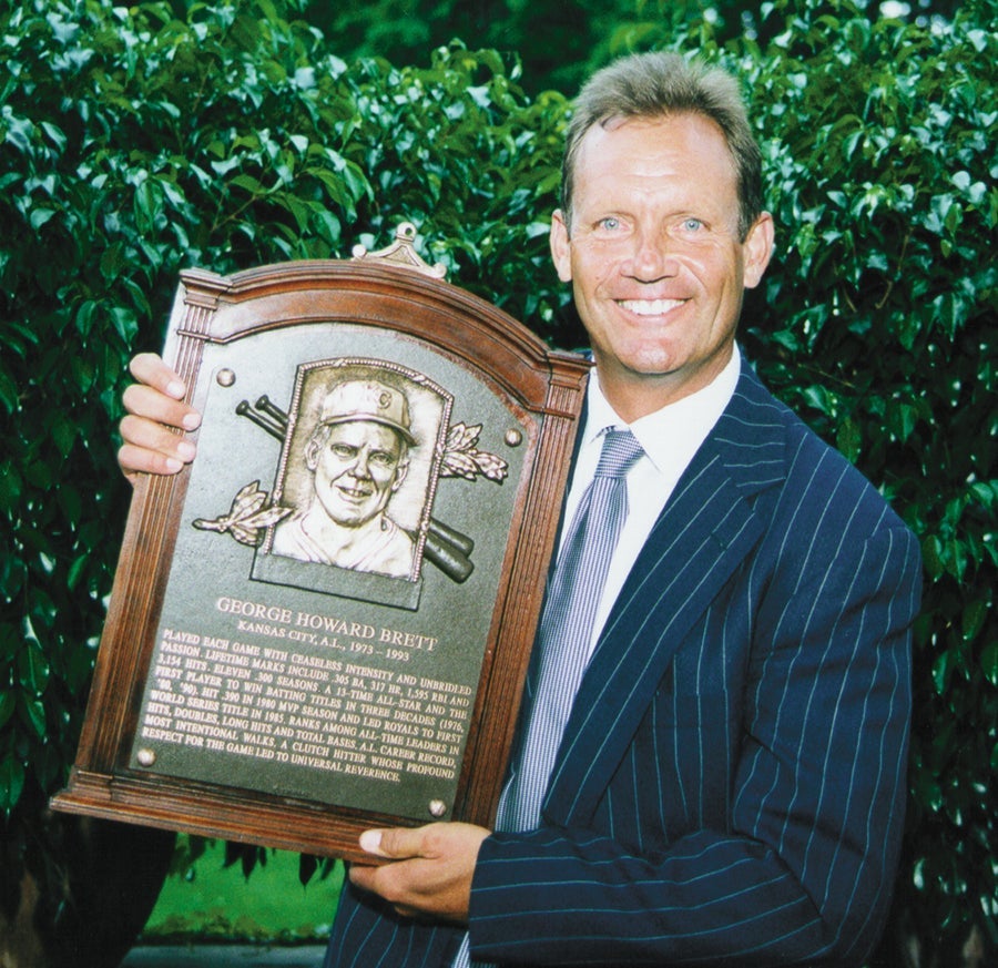 George Brett holds Hall of Fame plaque