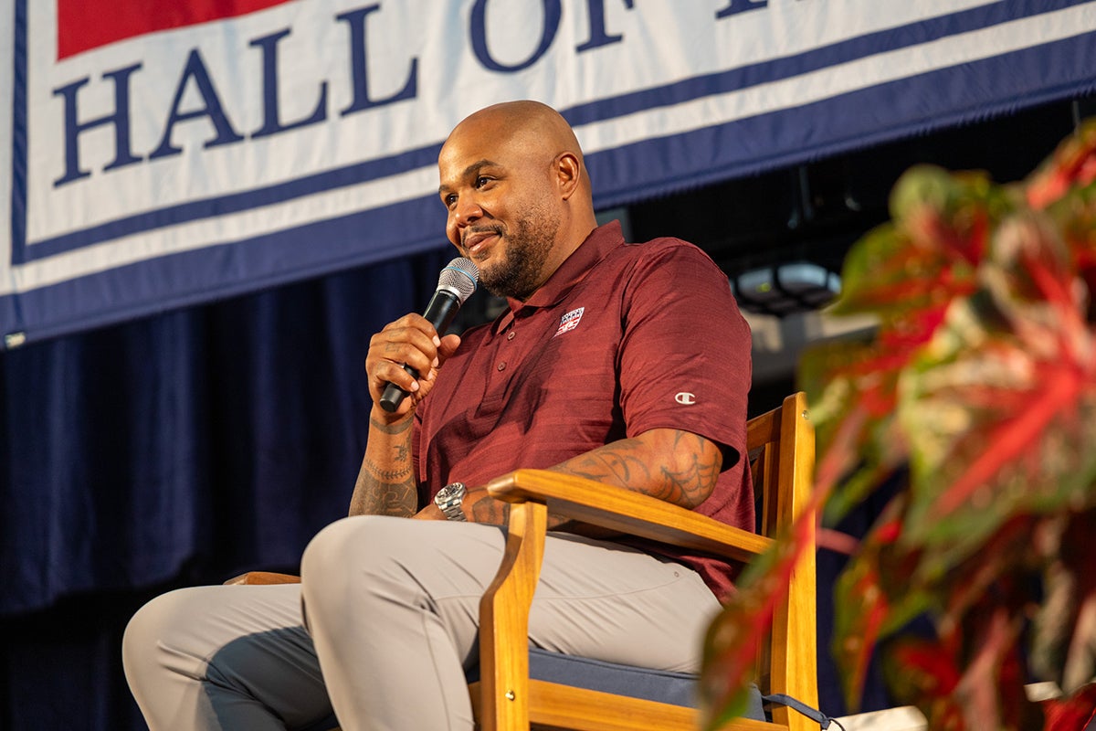 Andruw Jones on stage speaking into microphone