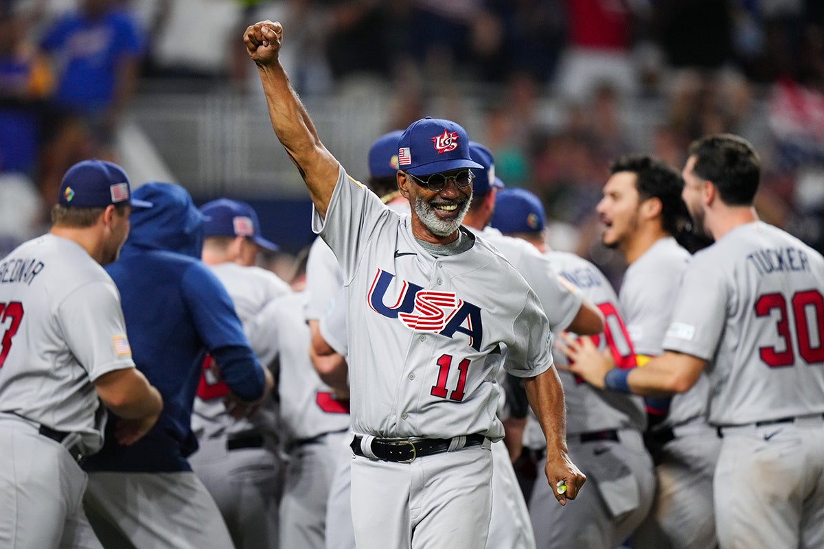 Jerry Manuel raises fist to celebrate World Baseball Classic victory