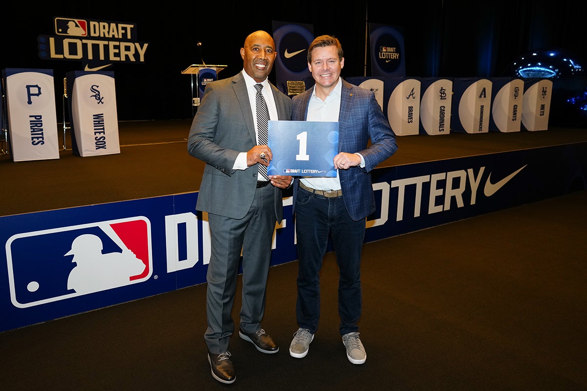 Harold Baines and Chris Getz hold No. 1 draft card