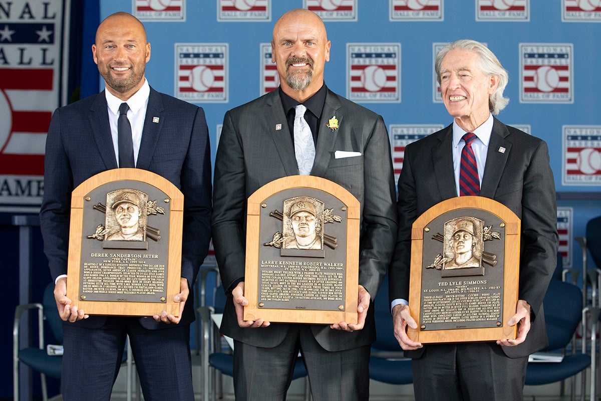 Derek Jeter, Larry Walker and Ted Simmons hold their Hall of Fame plaques