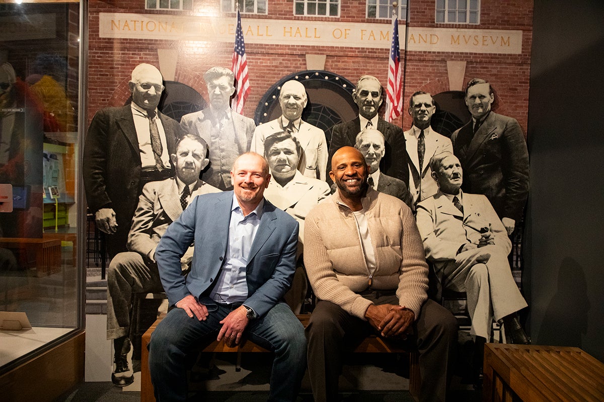 Billy Wagner and CC Sabathia seated in front of 1939 Induction Ceremony group picture