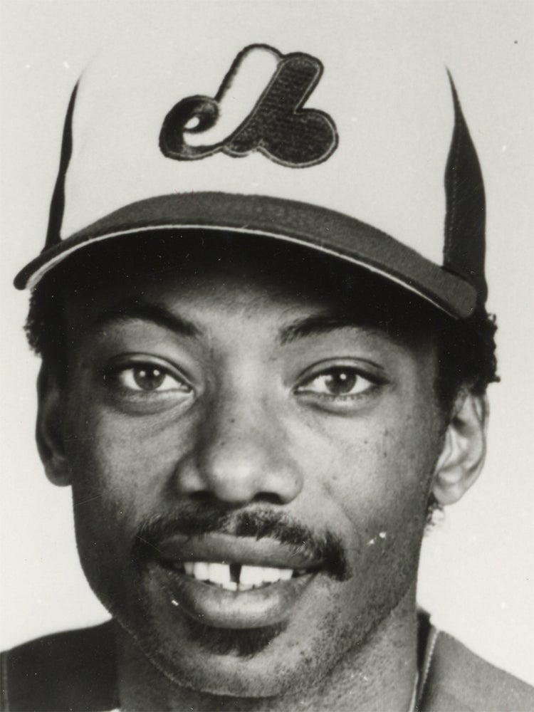 Head and shoulders portrait of Derrel Thomas in Expos uniform