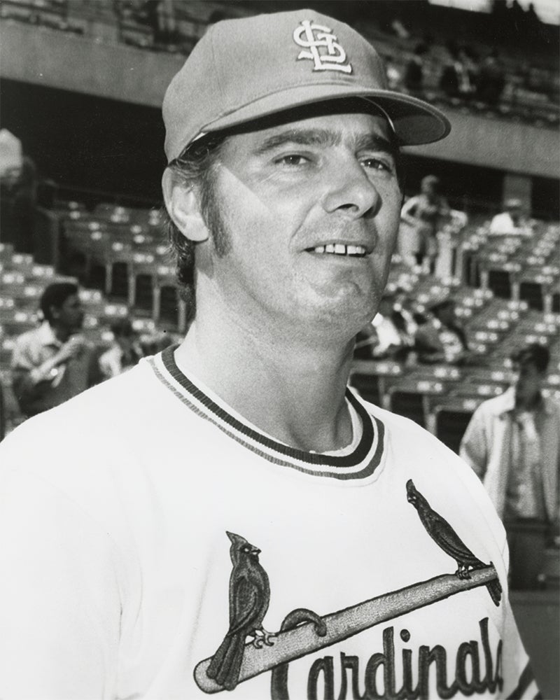 Head and shoulders portrait of George Brunet in Cardinals uniform