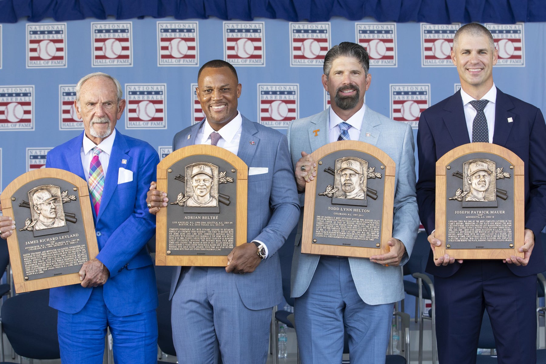 Jim Leyland, Adrian Beltré, Todd Helton and Joe Mauer holding Hall of Fame plaques