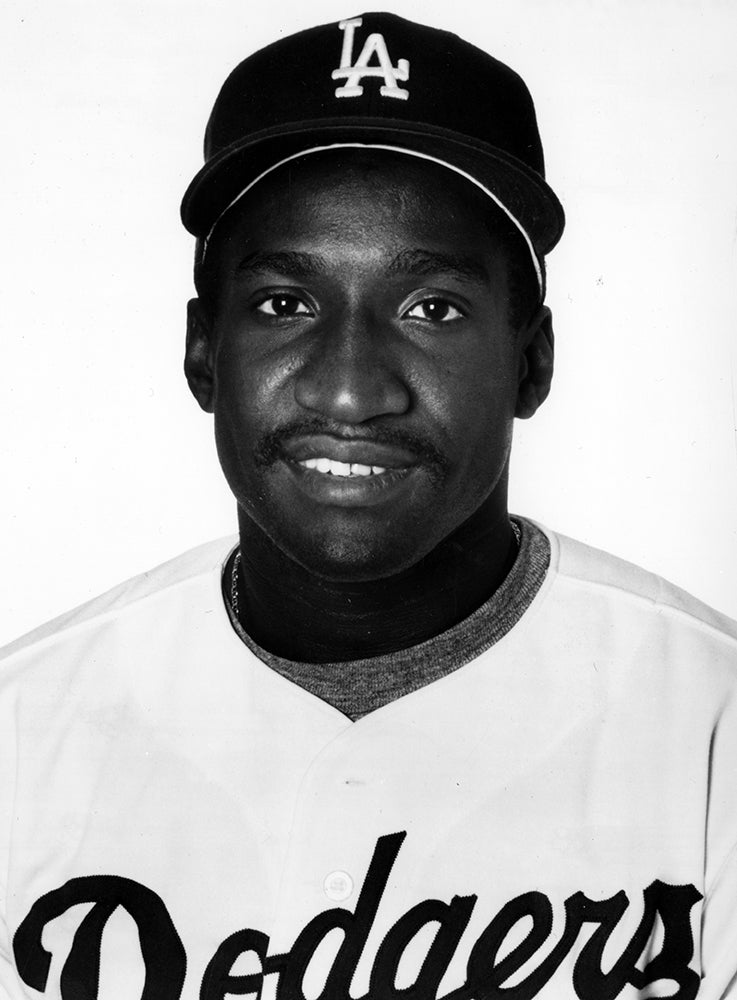 Head and shoulders portrait of Mike Devereaux in Dodgers jersey