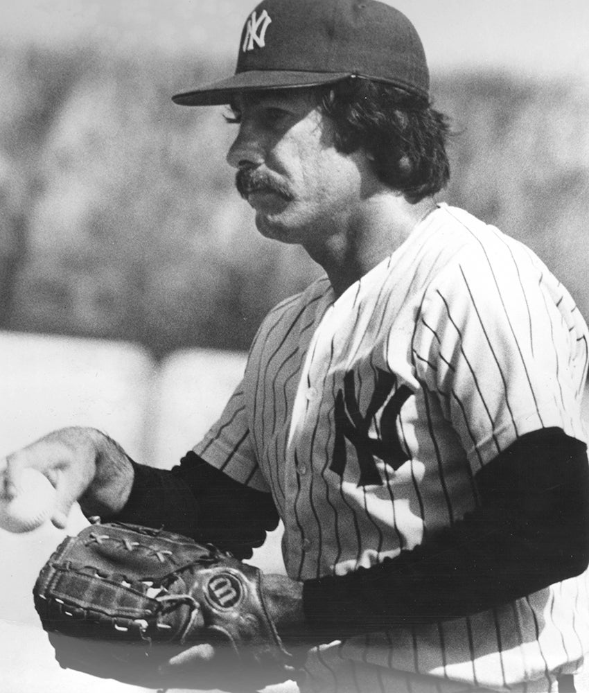 Head and shoulders portrait of Ed Figueroa in Yankees uniform