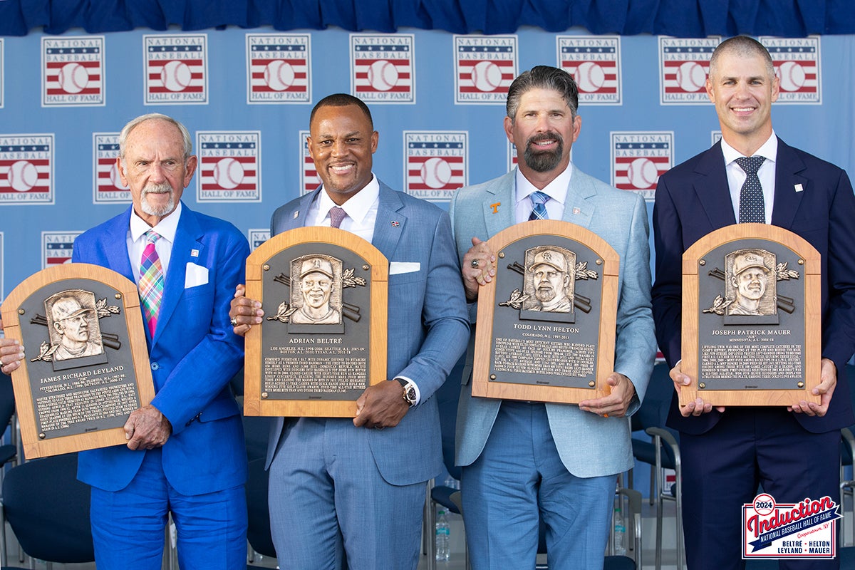 Jim Leyland, Adrian Beltré, Todd Helton and Joe Mauer hold their Hall of Fame plaques