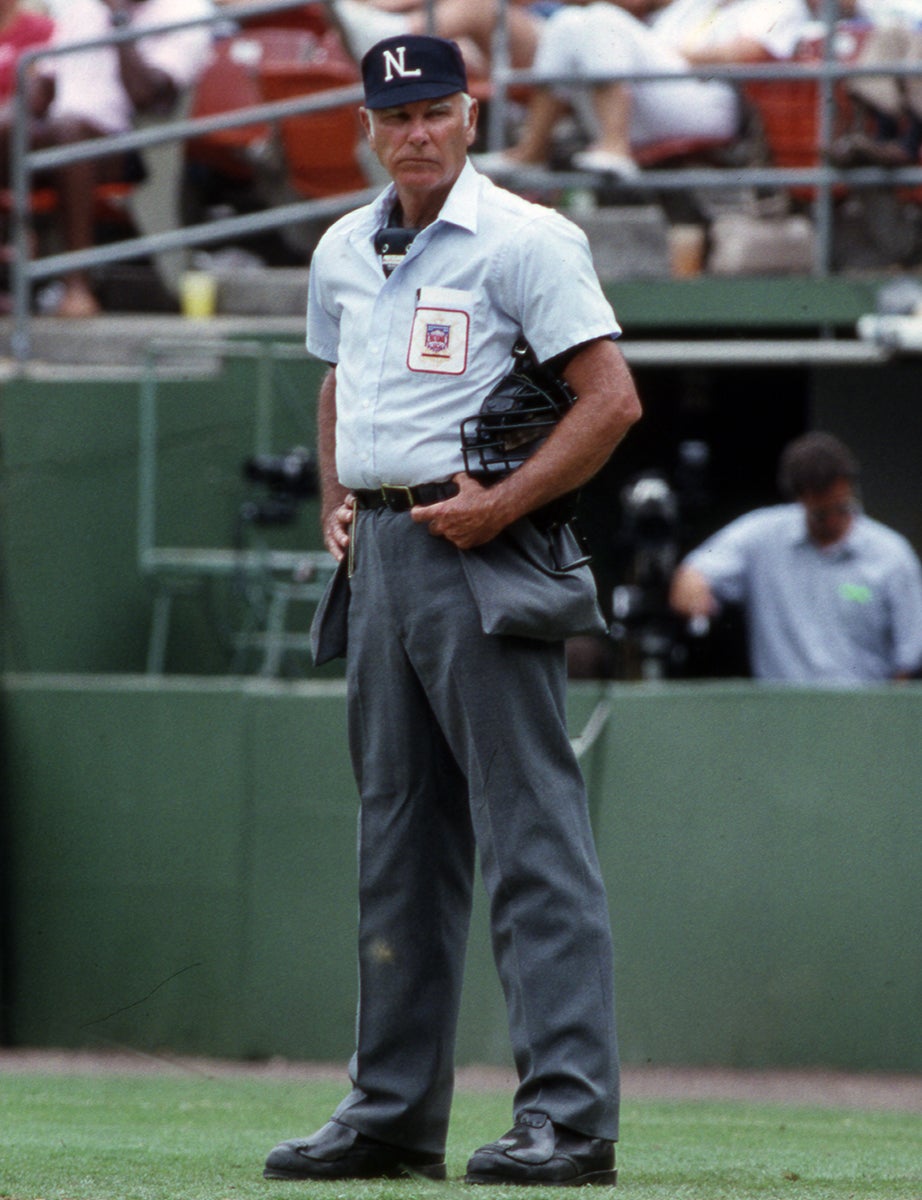 Doug Harvey in blue uniform