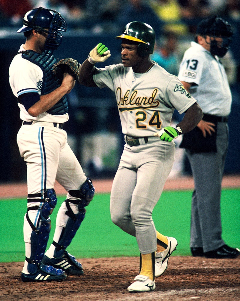 Rickey Henderson scores for Oakland