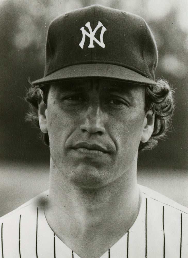 Head and shoulders portrait of Ken Holtzman in Yankees uniform