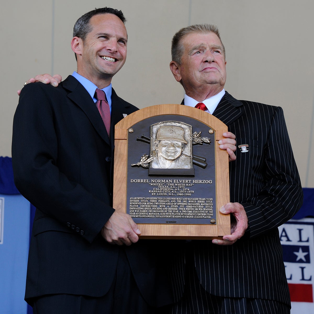 Whitey Herzog holds Hall of Fame plaque