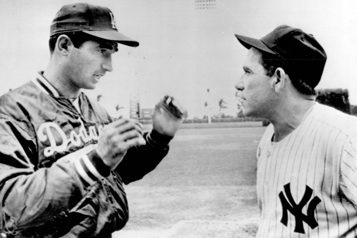 Sandy Koufax and Yogi Berra share a pregame conversation