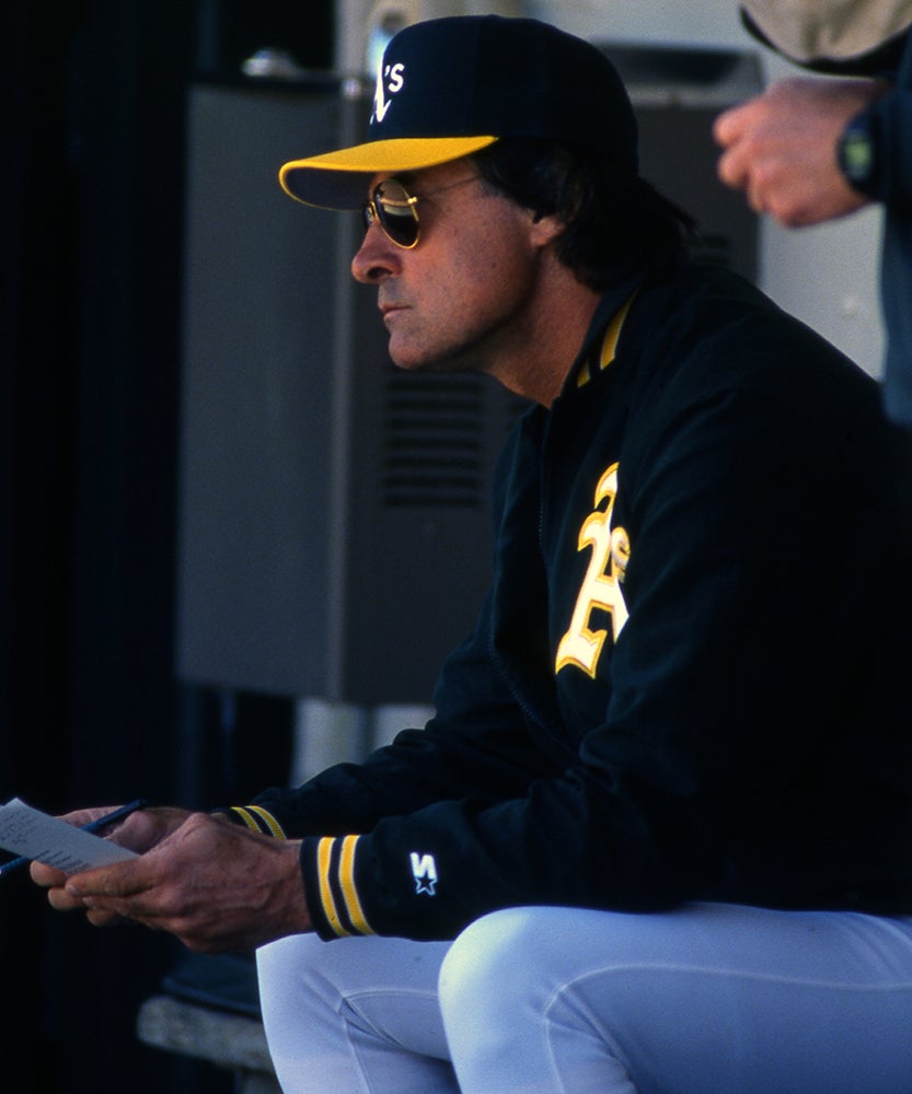 Tony La Russa seated in Athletics dugout