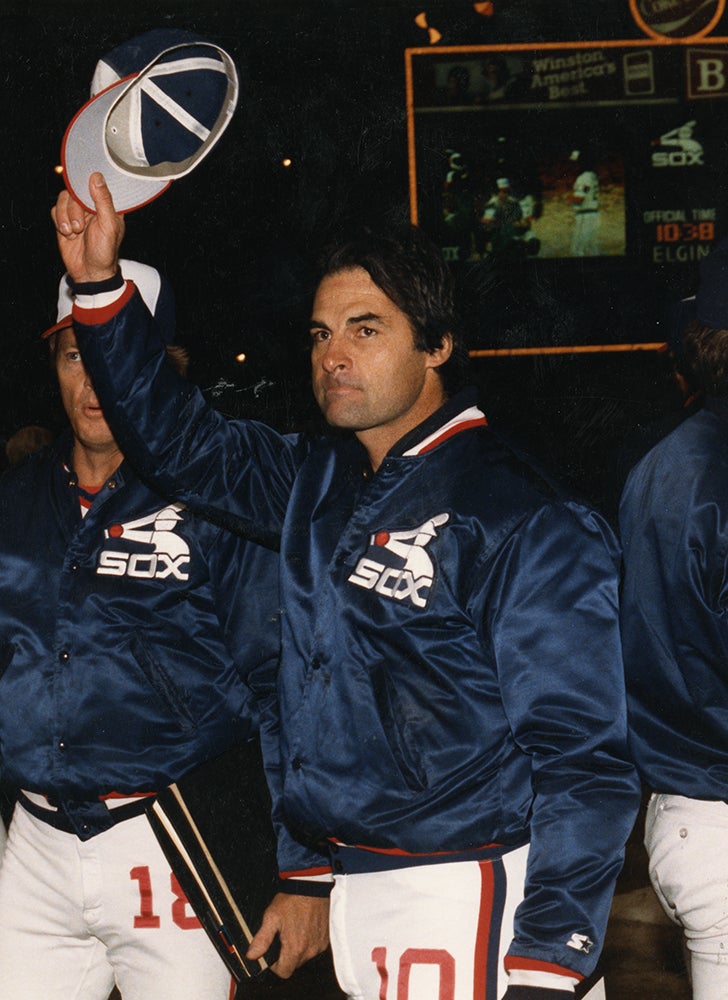 Tony La Russa tips cap in White Sox jacket