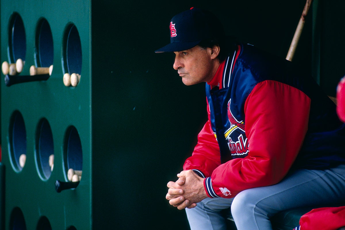 Tony La Russa sits in Cardinals dugout