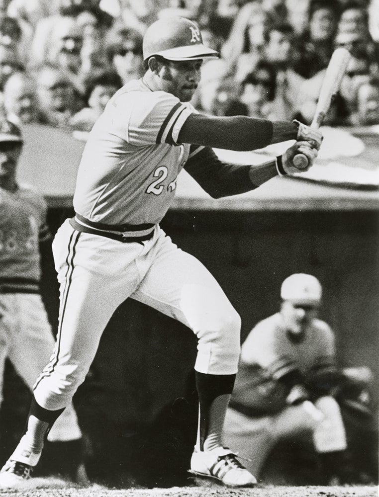 Ángel Mangual follows through on right-handed swing