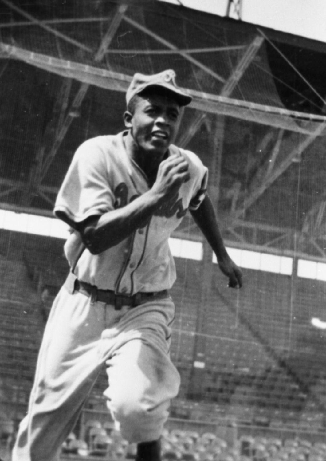 Jackie Robinson running the bases.