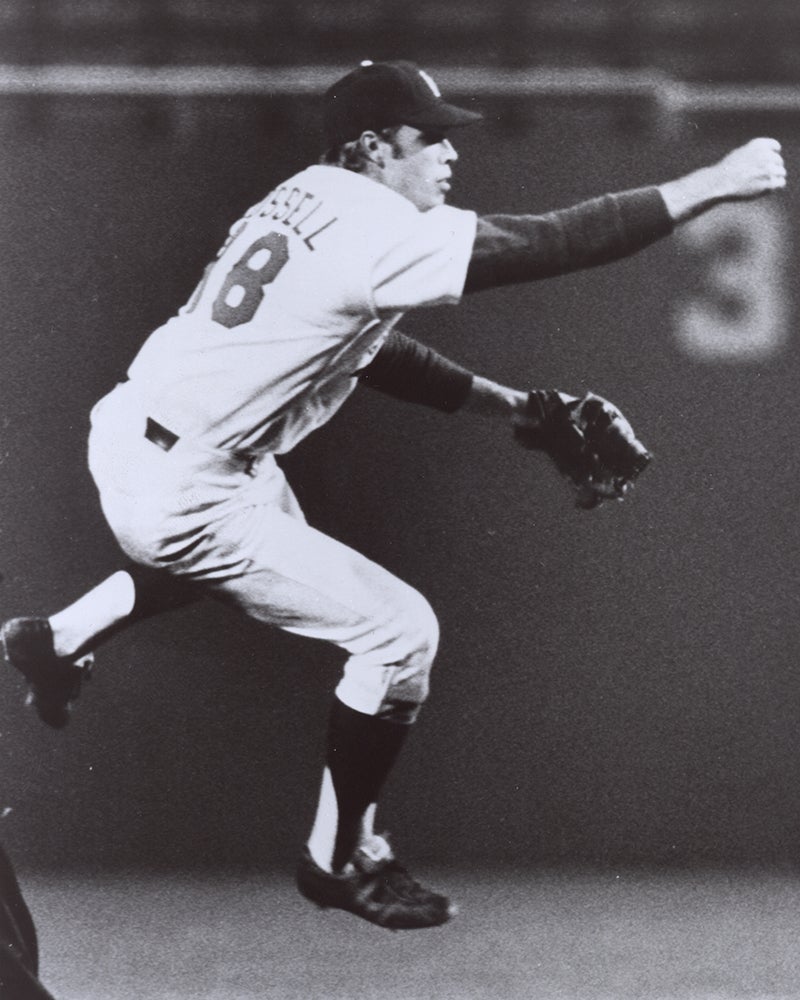 Bill Russell makes leaping throw