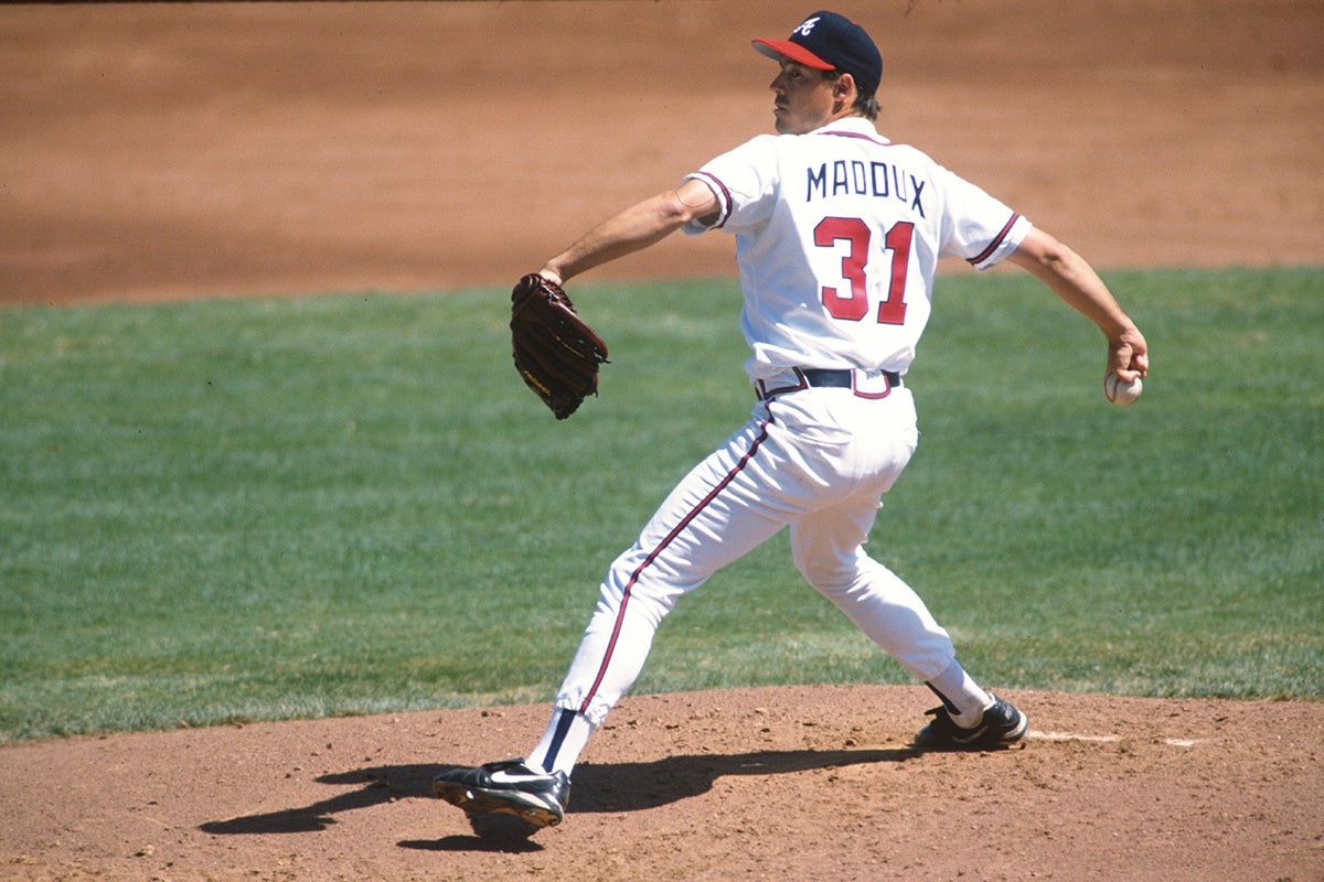 Greg Maddux pitches for Braves