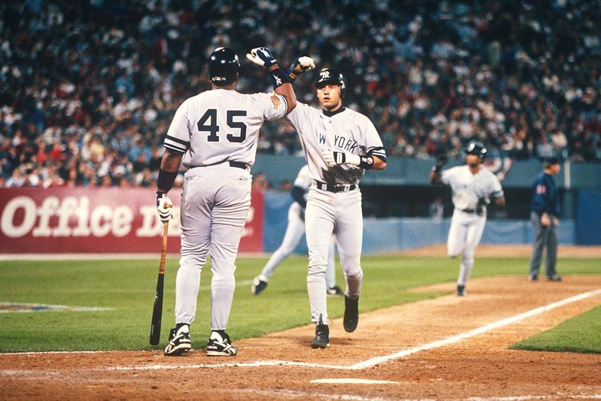 Cecil Fielder congratulates Derek Jeter