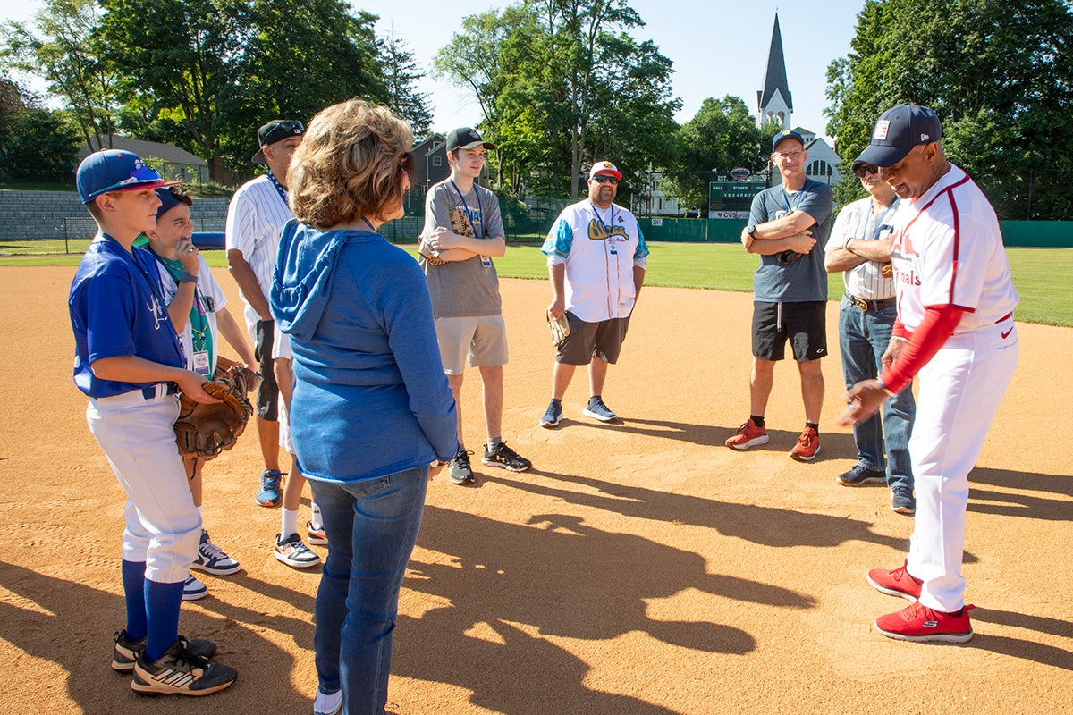 Ozzie Smith speaks with guests at Doubleday Field