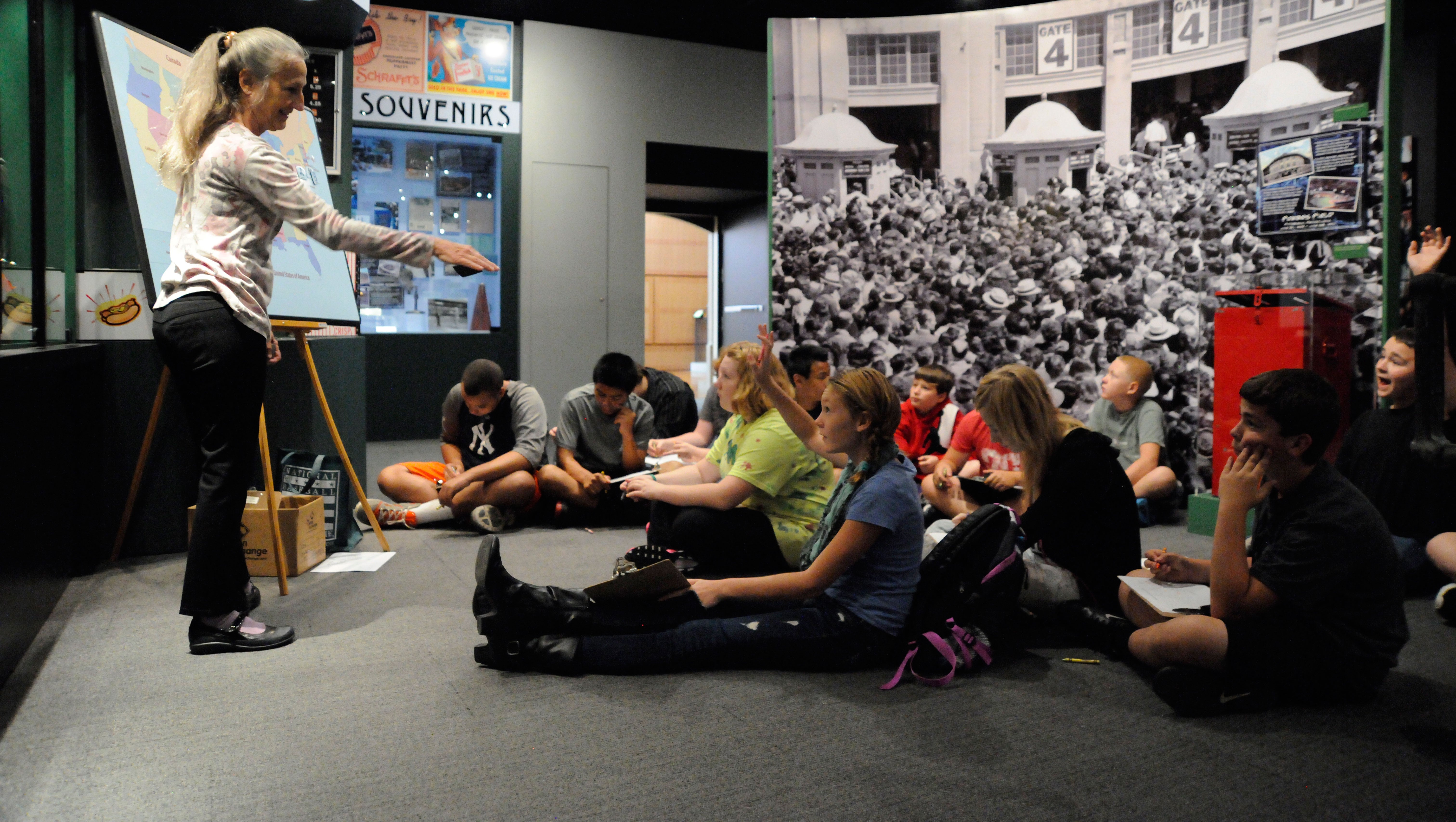 Students particpating in a lesson during a field trip to the Museum